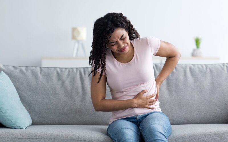 Health care, illness, pain in abdomen, side and back