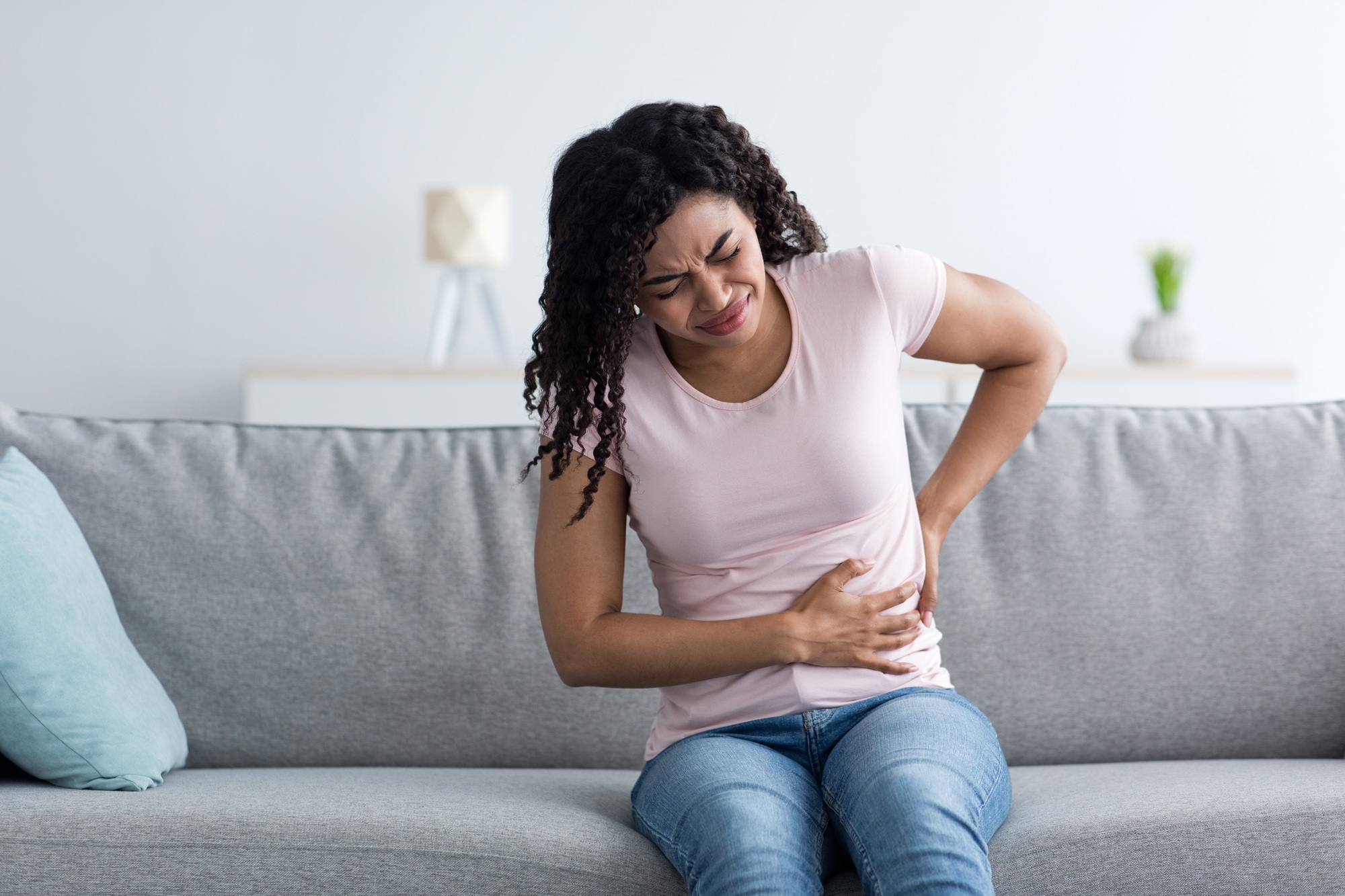 Health care, illness, pain in abdomen, side and back